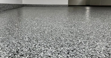 Clean epoxy garage floor with a smooth, glossy finish