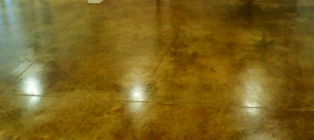 Beautifully stained concrete floor with a smooth, rich finish