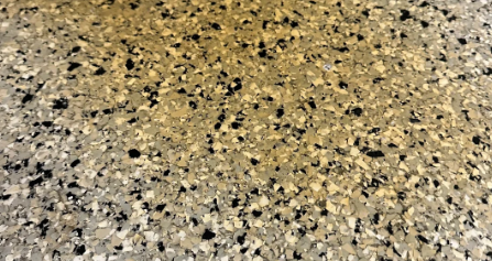 How to remove oil stains from an epoxy floor without damaging the coating